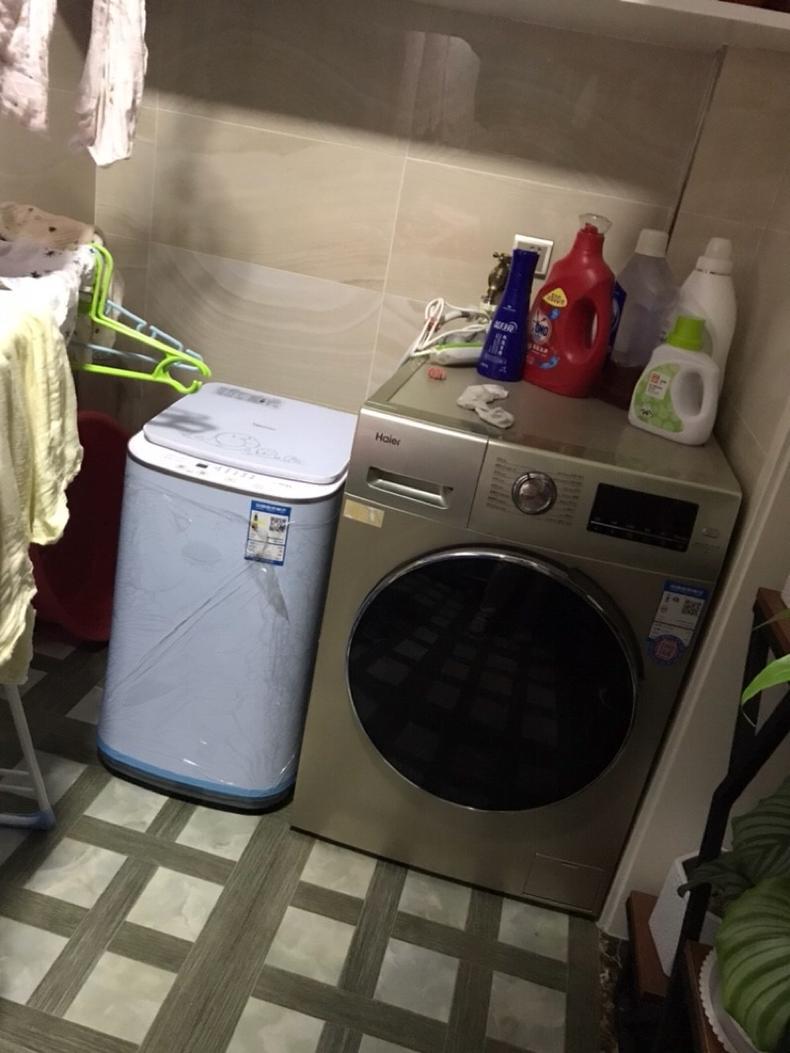 滚筒洗衣机放洗衣液的盒子拆卸方法